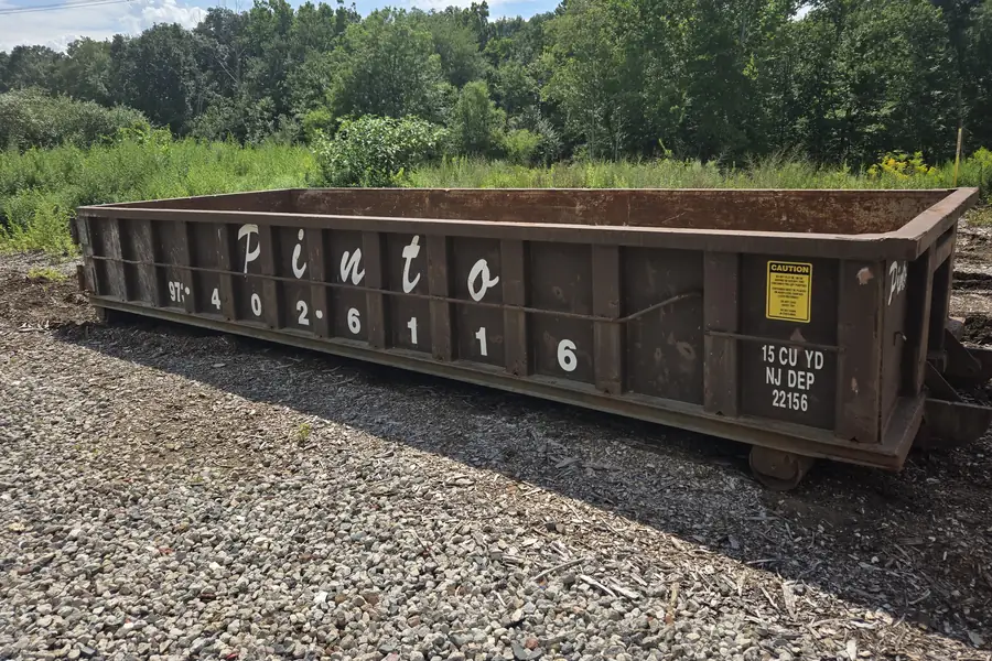 A Pinto of Montville 15-yard roll-off dumpster